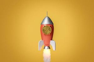 rocket ascending with an assembled Bitcoin photo