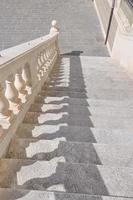 Detail of the steps of an ancient baroque stairway photo