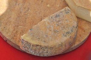 Fine traditional hand made British Cheddar cheese food photo