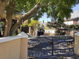 Typical cottage with garden and fences in the idyllic Claremont. photo