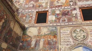 Ayder, Turkey, 2021 -  Zooming in on the ancient religious paintings at the interior walls of famous Sumela Monastery video