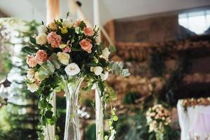 luxury decorated tables in the wedding hall. photo