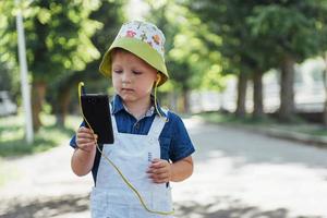 Cute boy posing for photo outdoors Ukraine. Europe