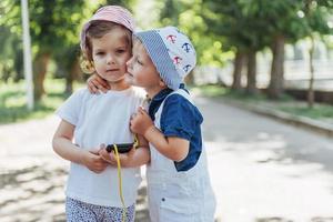 portrait of a little girl and her brother. photo