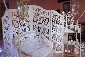 White wedding photo zone wooden sofa