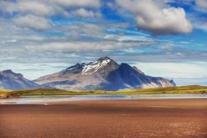 Gentle slopes of snow-capped mountains and glaciers. Wonderful I photo