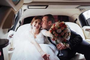 Happy man and woman smiling rejoicing in wedding day. photo