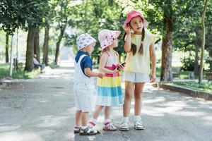 Cute girl and boy listening to music photo