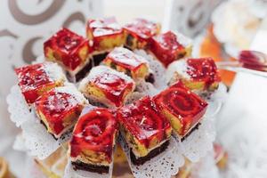 Close up strawberry cake with red jelly photo