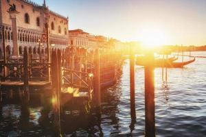 City landscape. Fantastic views of the gondola at sunset, moored photo