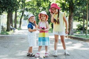 Cute girl and boy listening to music photo