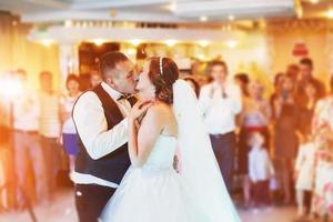 Happy bride and groom their first dance photo