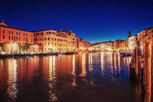 City landscape. Rialto Bridge in Venice, Italy photo