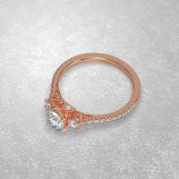 3 stone engagement ring laying down position in rose gold 3D render photo