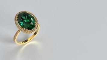 oval halo engagement ring with center emerald color stone photo