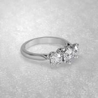 3 stone engagement ring in gold 3D render photo