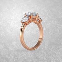 3 stone engagement ring standing position in rose gold 3D render photo