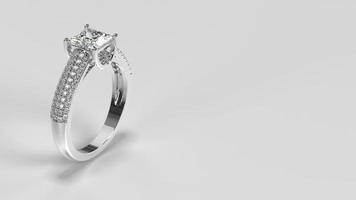 anillo de compromiso princesa de oro blanco con piedras laterales de tres capas foto