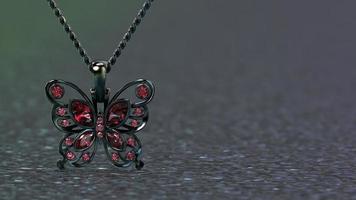 beautiful butterfly pendant 3d render in black gold and ruby set stones photo