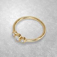 3 stone engagement ring laying down position in yellow gold 3D render photo