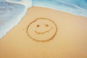 The drawings in the sand at the beach photo