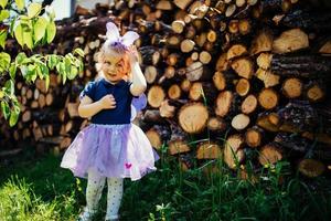 beautiful girl in a fairy costume with butterfly wings photo