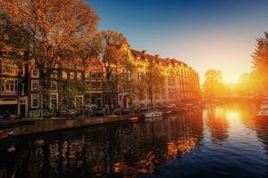 Fantastic sunset that shines on buildings photo