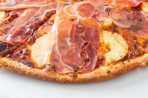 Pizza with prosciutto or parma ham pizza photo