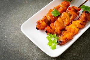 grilled chicken skewer with herbs and spices photo