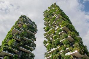 Milan Italy 30 May 2018 Vertical forest buildings.It's called like this because each tower will house trees between 3 and 6 meters which will help mitigate smog and produce oxygen photo