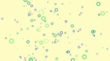 Green and blue circle particle motion background. Faded wallpaper animation with pastel color. Flying bubble.