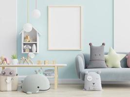 Blue sofa and doll,cute pillows in elegant child's room with posters on the wall. photo