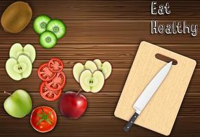 Fresh fruits slices on the table with a knife on a cutting board background vector