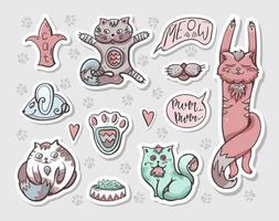 set of stickers with cats. Hand-drawn vector images with labels.