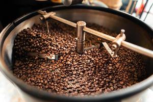 Roasted coffee beans in a cooling machine photo