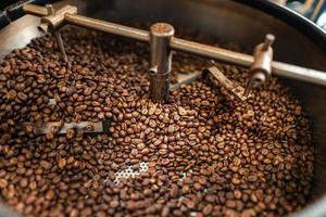 Roasted coffee beans in a cooling machine photo