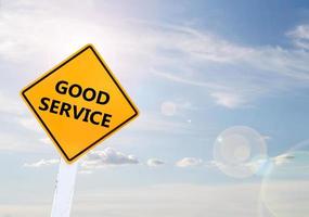 Text for GOOD SERVICE on yellow road sign