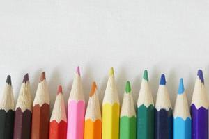 Multicolour  Pencils against White Background photo