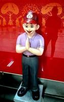 Smiling child statue with folded hands symbolizes the traditional Indian greeting Namaste at lucknow metro station photo