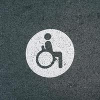 wheelchair traffic signal on the street photo