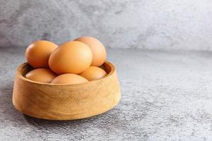 fresh chicken eggs on the table photo