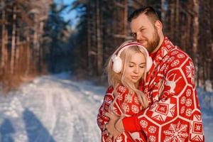 couple in love on a walk in the winter , a romantic relationship between a man and a woman photo