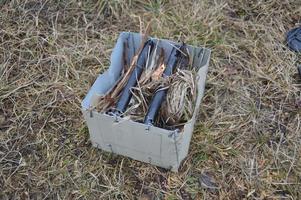 Metal stove for burning wood chips and firewood photo