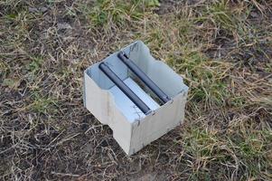 Metal stove for burning wood chips and firewood photo