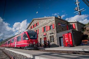 Bernina Switzerland July 2015 Hospice railway station red train bernina photo