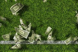 Green grass with dollar bills. Gambling thoughts. photo