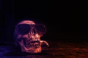 Skulls are smoking Concept of Smoking Cessation Campaign And Halloween photo