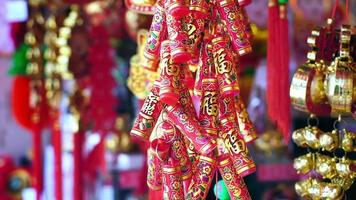 Chinese New Years decorations and fake firecrackers words mean best wishes and good luck