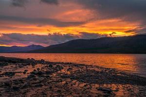 Sunset at Lake McDonald in Montana photo