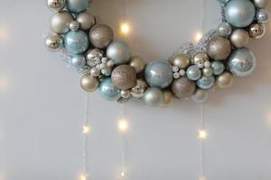 White Christmas background. White Christmas wreath on white background. Copy space. selective focus. photo